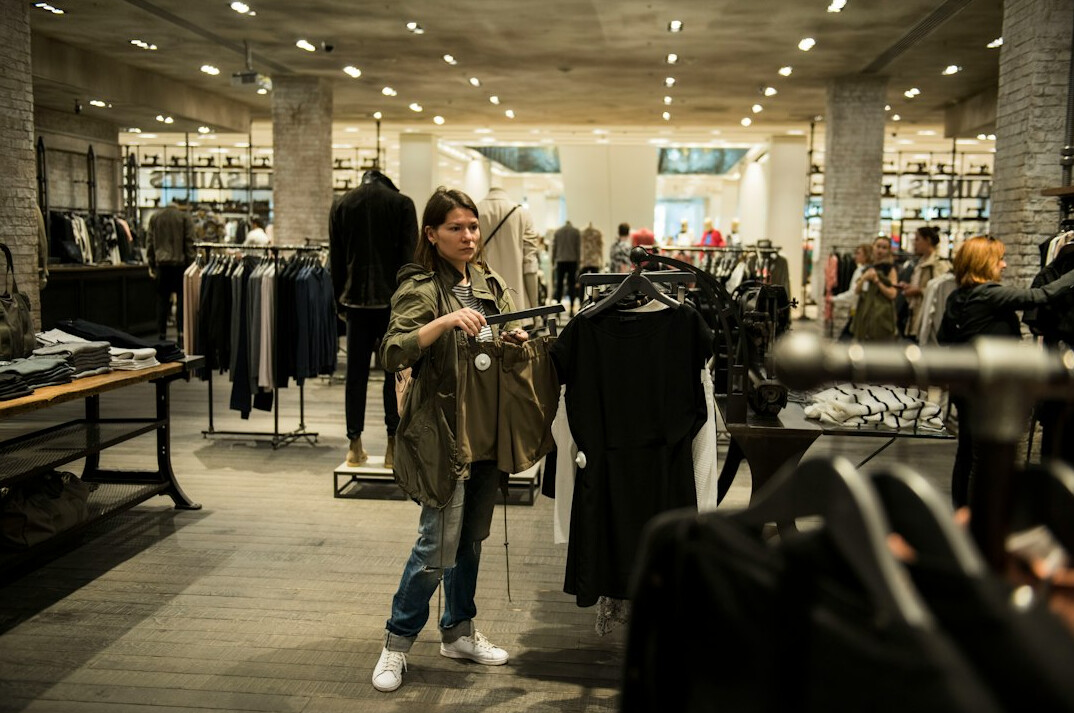 store detective watching shopper
